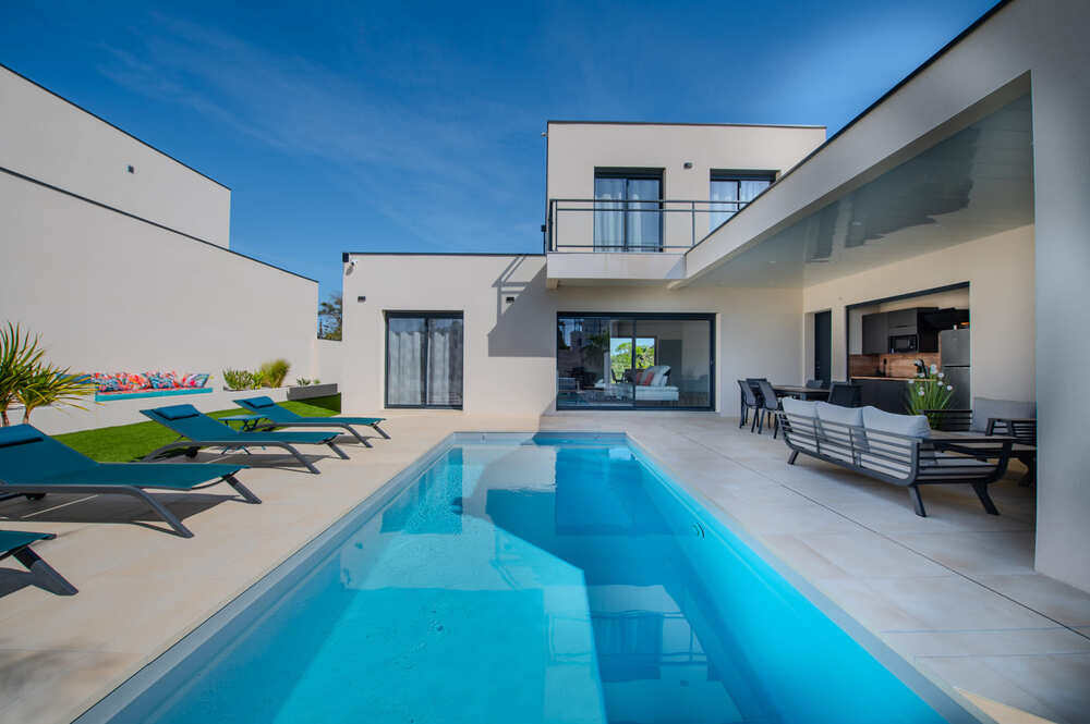 Art extérieur de maison construite par Maison Kamci à Narbonne